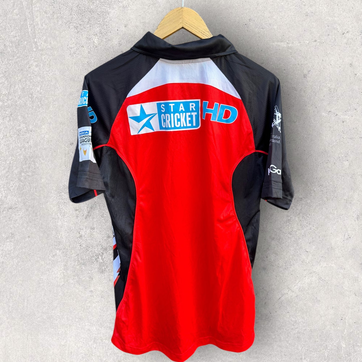 SOUTH AUSTRALIAN REDBACKS CHAMPIONS LEAGUE CRICKET 2010 TEAM SIGNED JERSEY NEW WITH TAGS