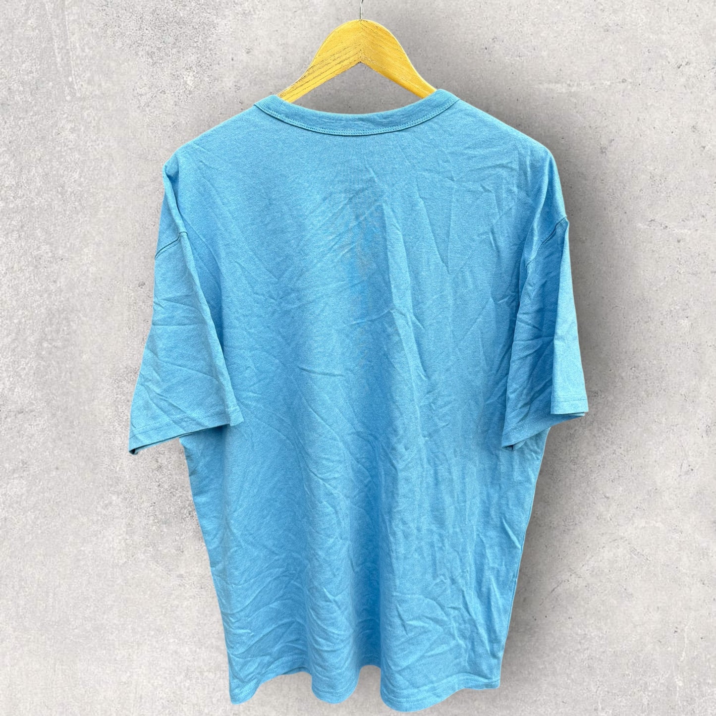 NIKE LOOSE FIT LIGHT BLUE SHORT SLEEVED SHIRT