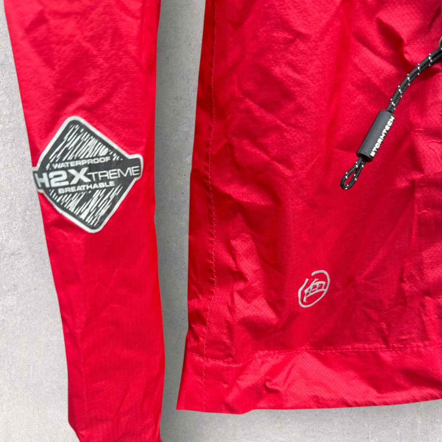 SYDNEY SWANS STORMTECH H2XGTREME WINDBREAKER JACKET