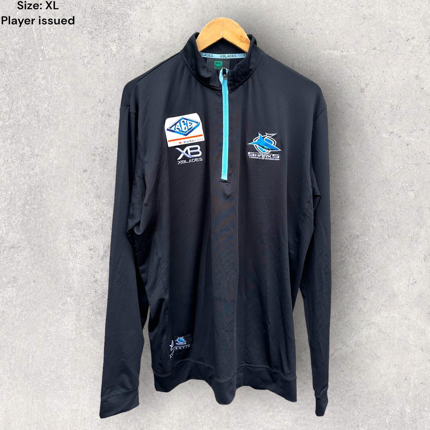 CRONULLA SHARKS HALF ZIP PLAYER ISSUED JUMPER