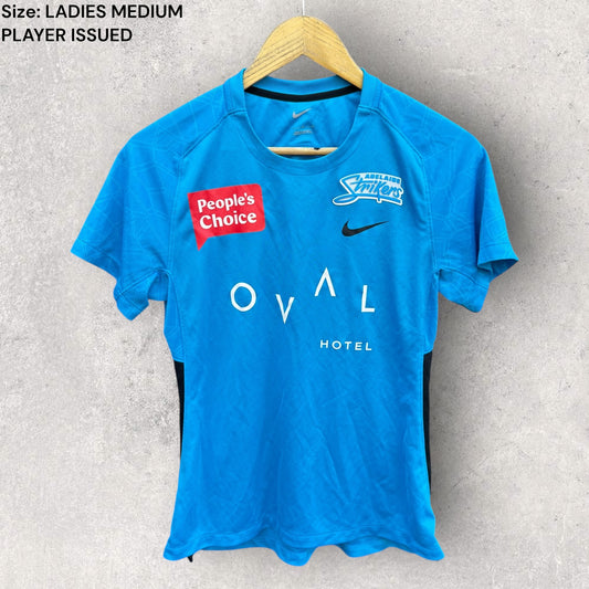 ADELAIDE STRIKERS PLAYER WORN NIKE WBBL TRAINING SHIRT ISSUED TO AJ WELLINGTON