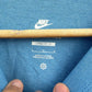 NIKE LOOSE FIT LIGHT BLUE SHORT SLEEVED SHIRT