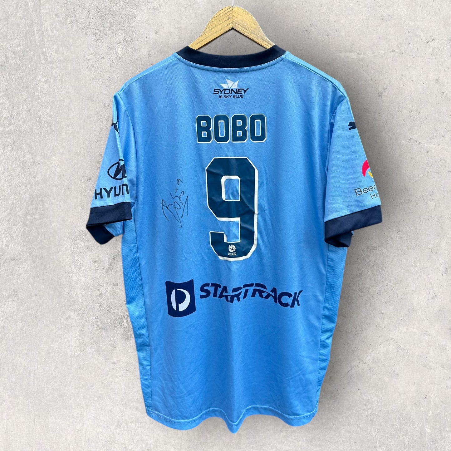 BOBO SIGNED SYDNEY FC 2015-2016 PUMA HOME FOOTBALL JERSEY