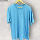 NIKE LOOSE FIT LIGHT BLUE SHORT SLEEVED SHIRT
