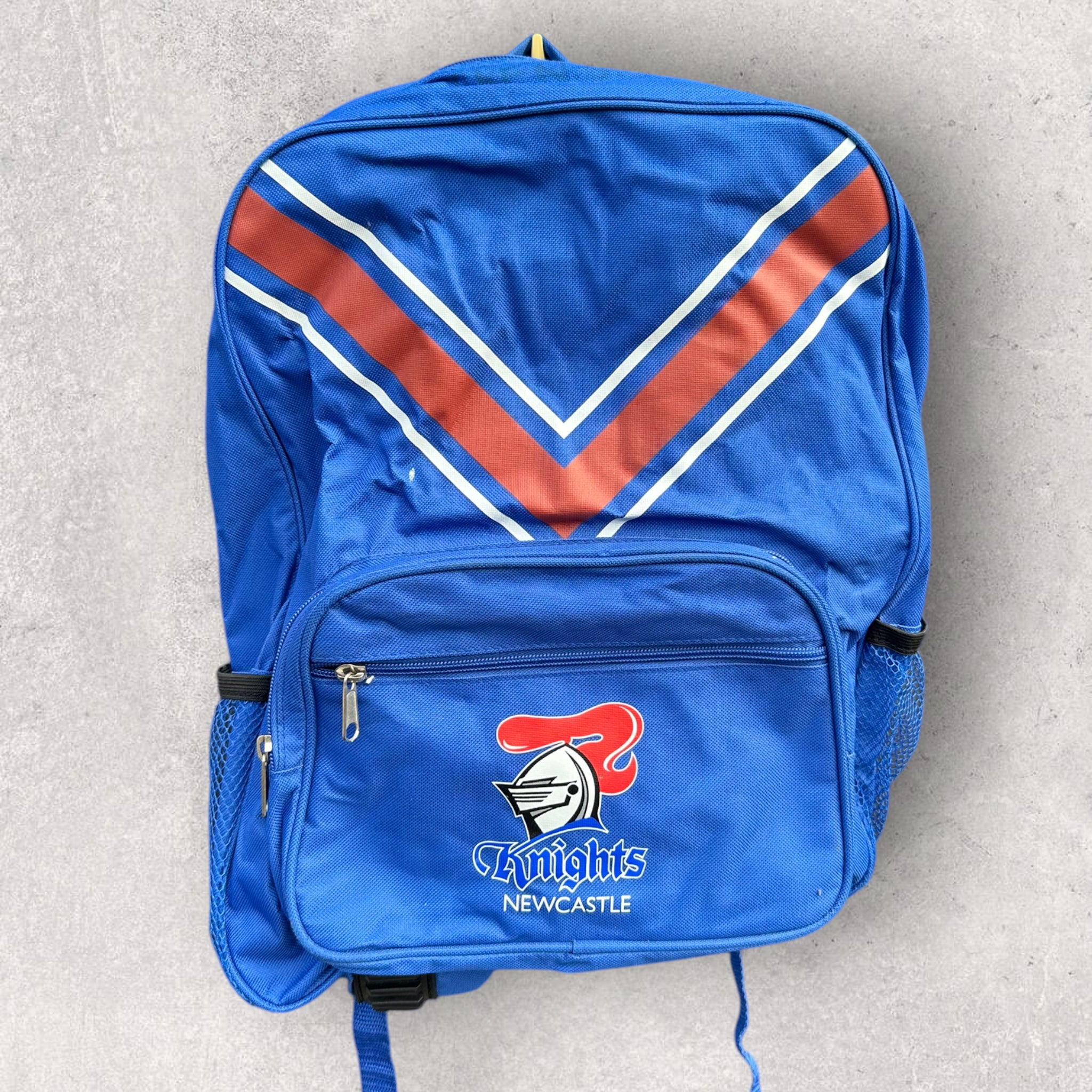 NEWCASTLE KNIGHTS BLUE BACKPACK – THRILLOFTHETHRIFT