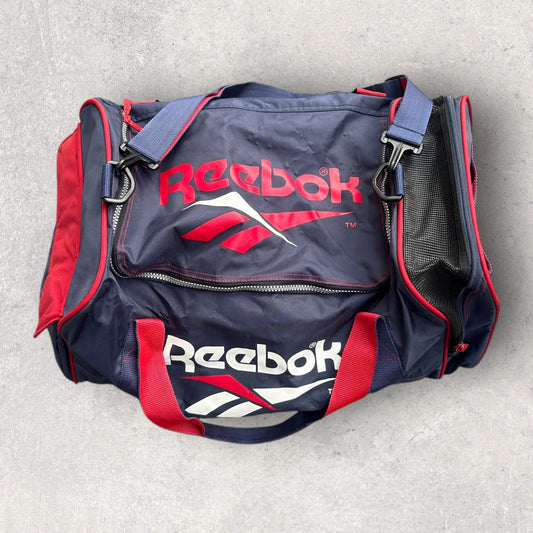REEBOK VINTAGE BLUE & RED DUFFEL BAG