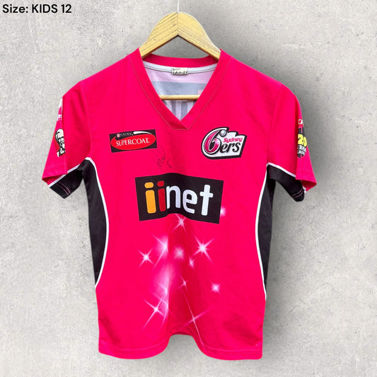 SYDNEY 6s KIDS CRICKET JERSEY SIGNED BY BRETT LEE