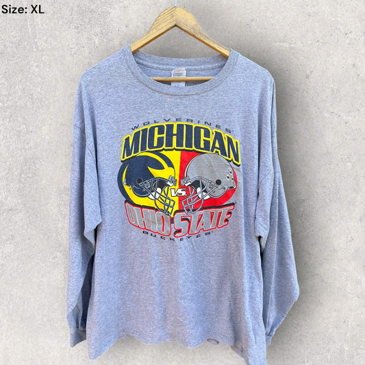 MICHIGAN WOLVERINES VS OHIO STATE BUCKEYES NCAA DELTA LONG SLEEVE GREY SHIRT
