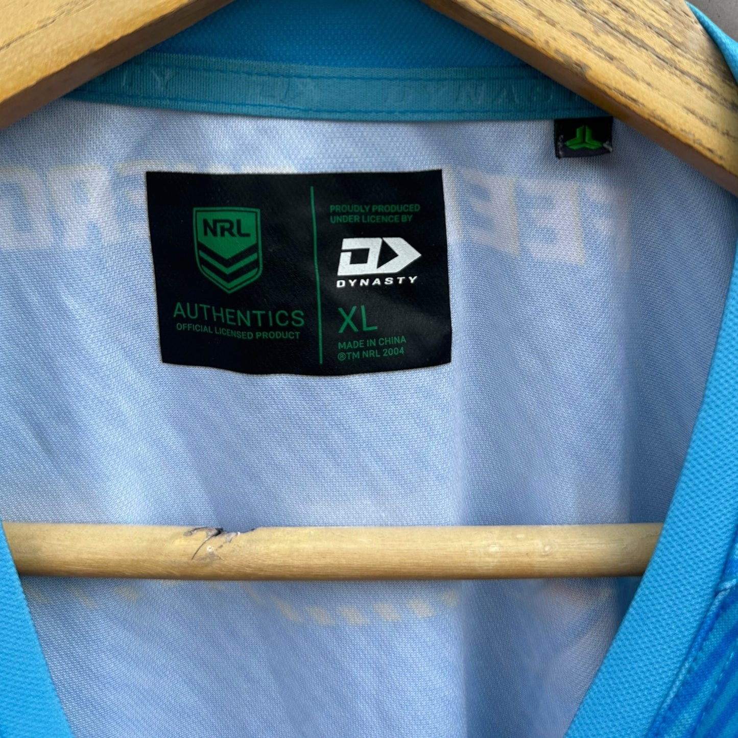 GOLD COAST TITANS PLAYER TRAINING SHIRT ISSUED TO SAM MCINTYRE