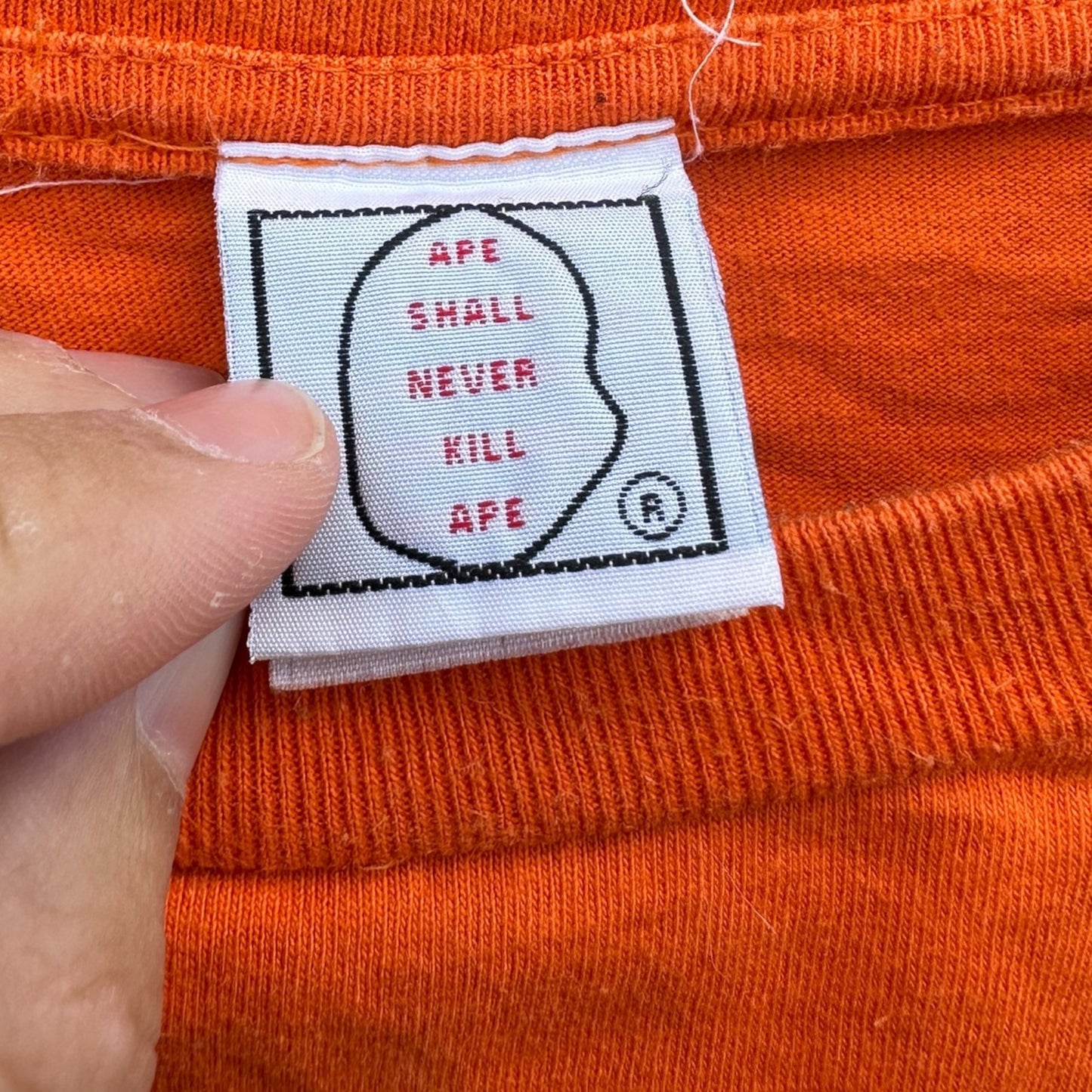 A BATHING APE ORANGE SHORT SLEEVE LADIES SHIRT