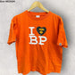 A BATHING APE ORANGE SHORT SLEEVE LADIES SHIRT