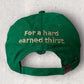 VB HARD EARNED THIRST GREEN BASEBALL HAT