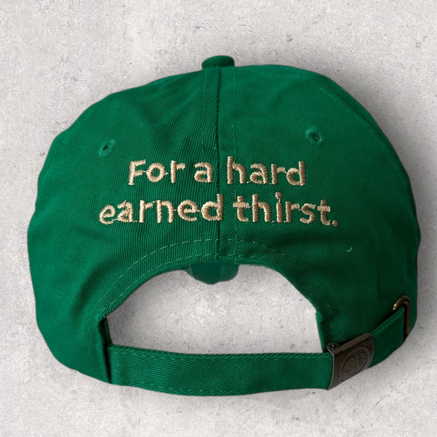 VB HARD EARNED THIRST GREEN BASEBALL HAT