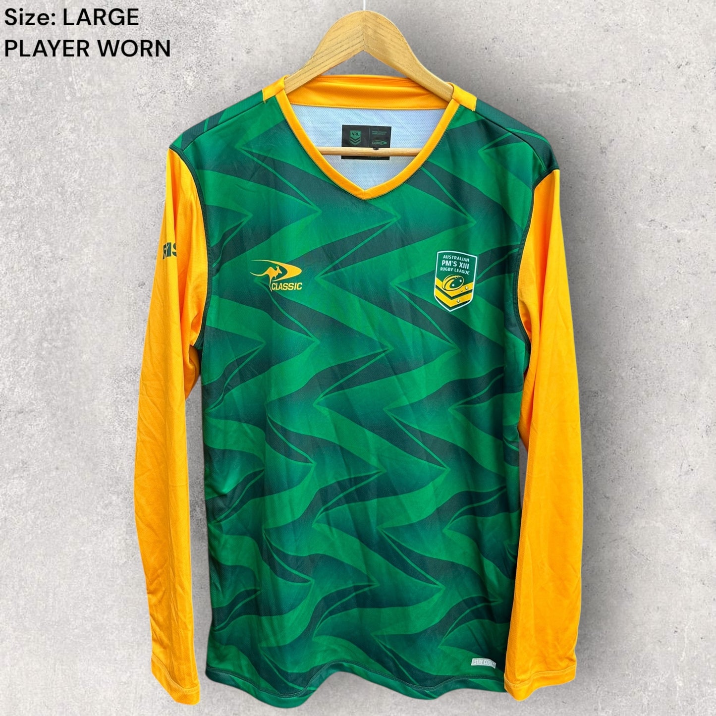 AUSTRALIAN KANGAROOS PM XIII PLAYER ISSUED LONG SLEEVE TRAINING SHIRT ISSUED TO DYLAN LUCAS