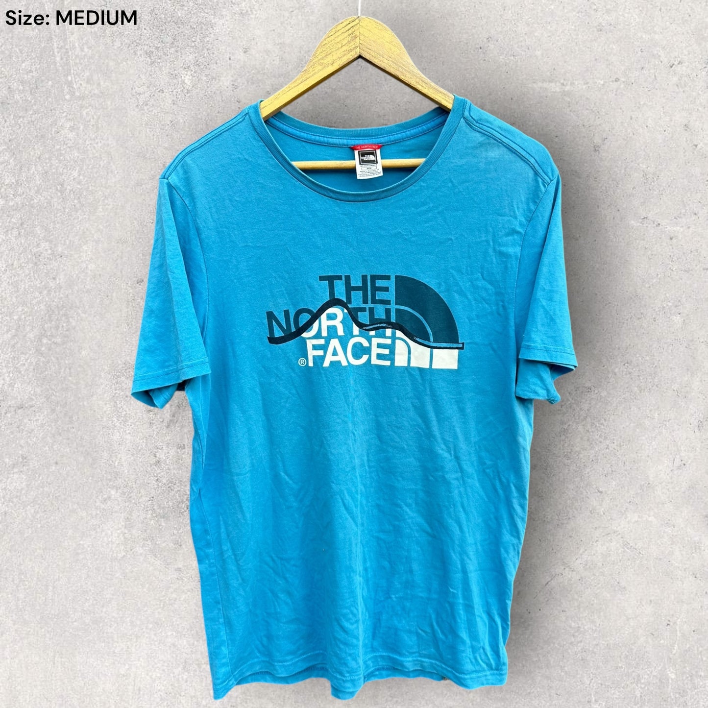 THE NORTH FACE BLUE SHORT SLEEVED SHIRT