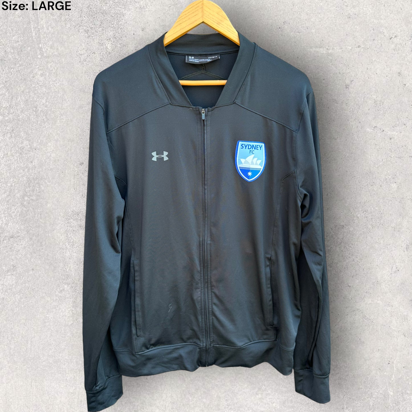 SYDNEY FC BLACK FULL ZIP UNDER ARMOUR JACKET