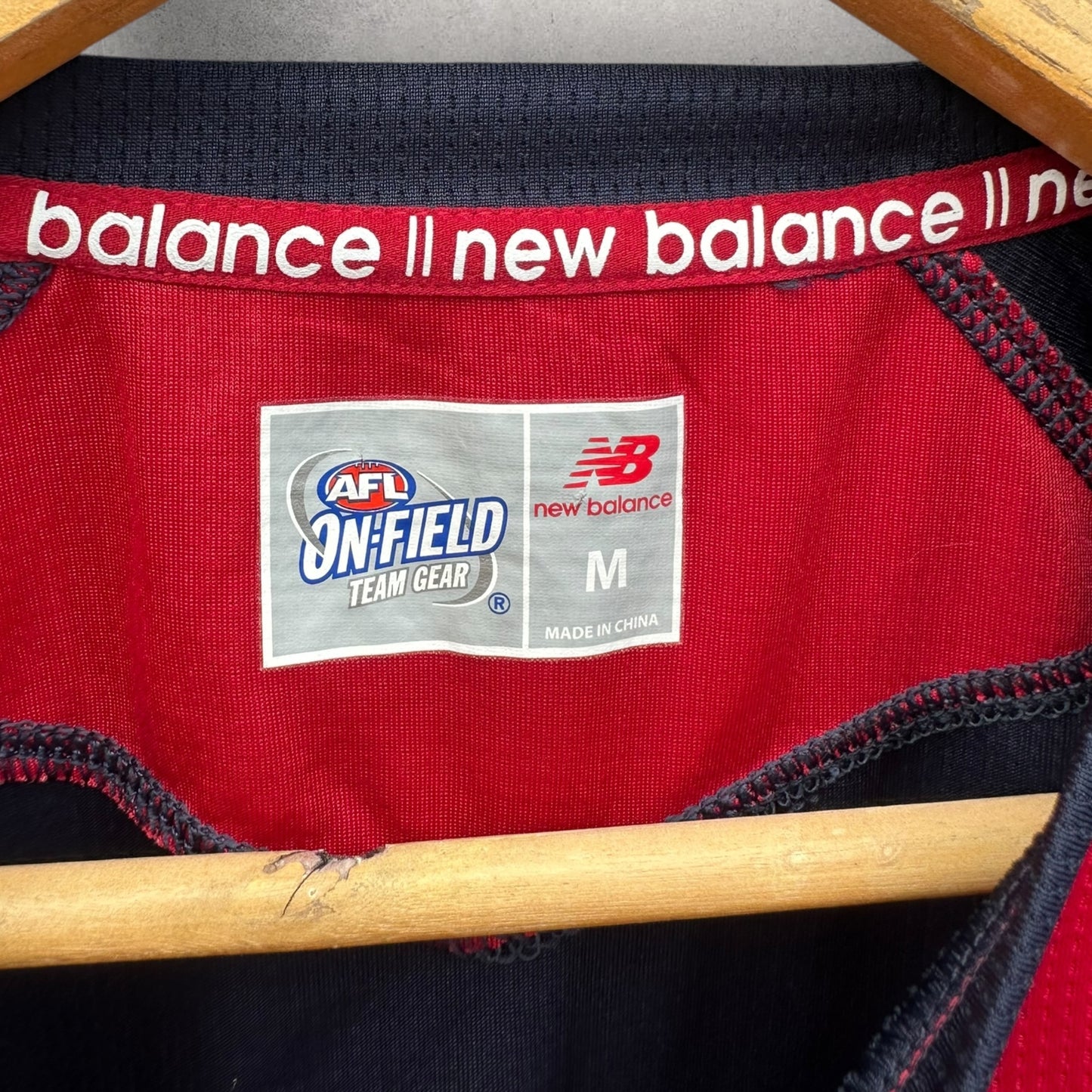 MELBOURNE DEMOMS ONFIELD NEW BALANCE TRAINING SHIRT