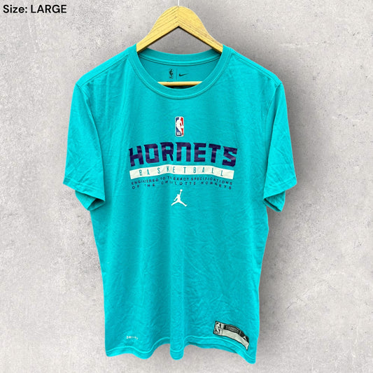 CHARLOTTE HORNETS NIKE BLUE TRAINING NBA SHIRT