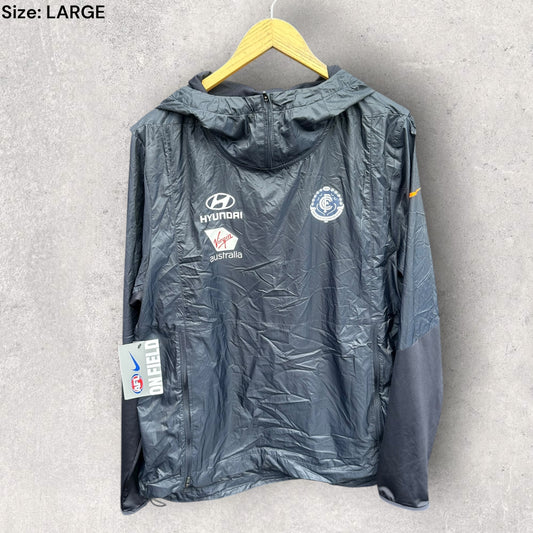 CARLTON BLUES NIKE ON FIELD WET WEATHER WIND JACKET BRAND NEW WITH TAGS