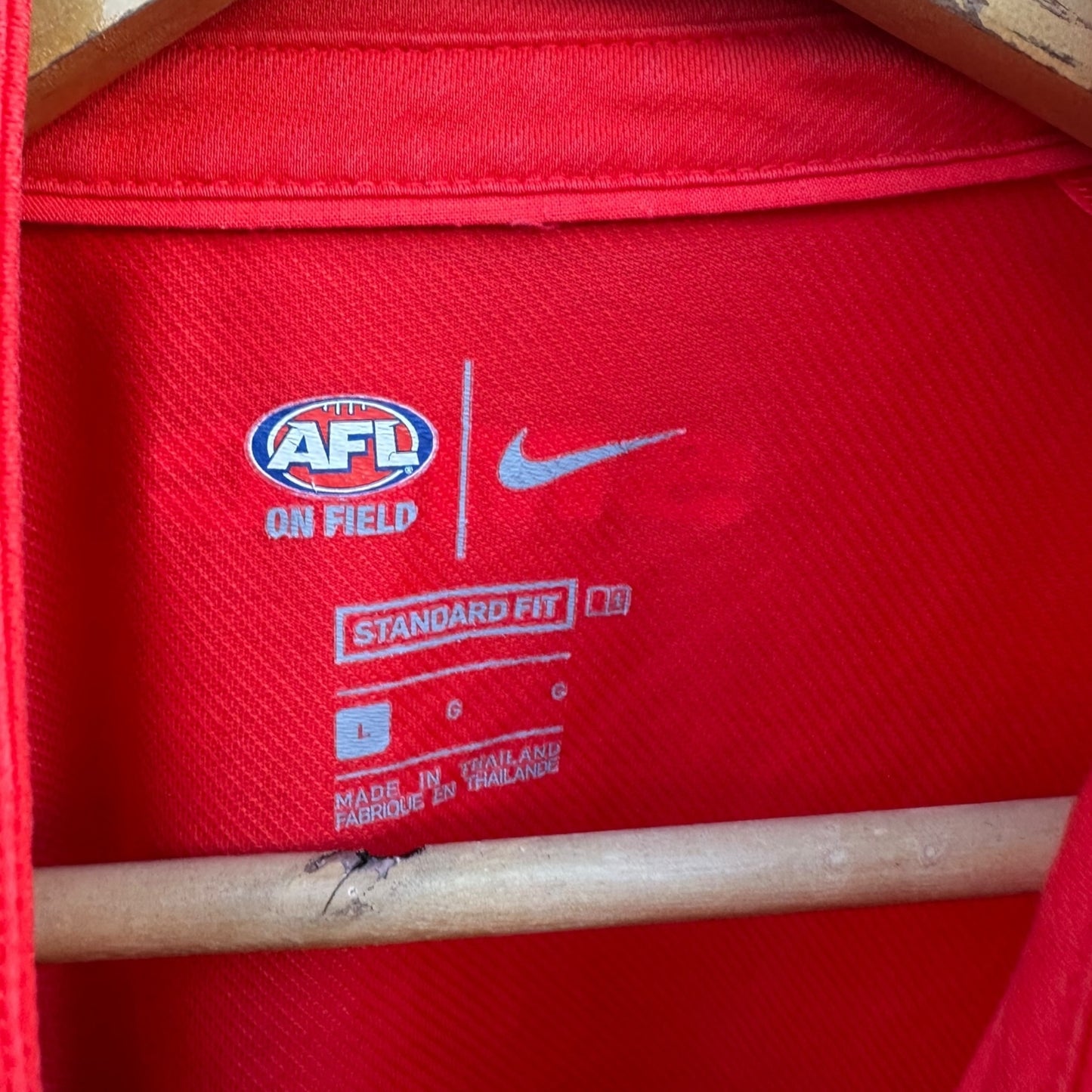 SYDNEY SWANS NIKE ON FIELD RED MEDIA POLO SHIRT