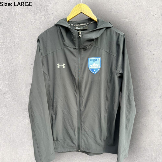 SYDNEY FC UNDER ARMOUR BLACK WINDBREAKER/WET WEATHER HOODED JACKET
