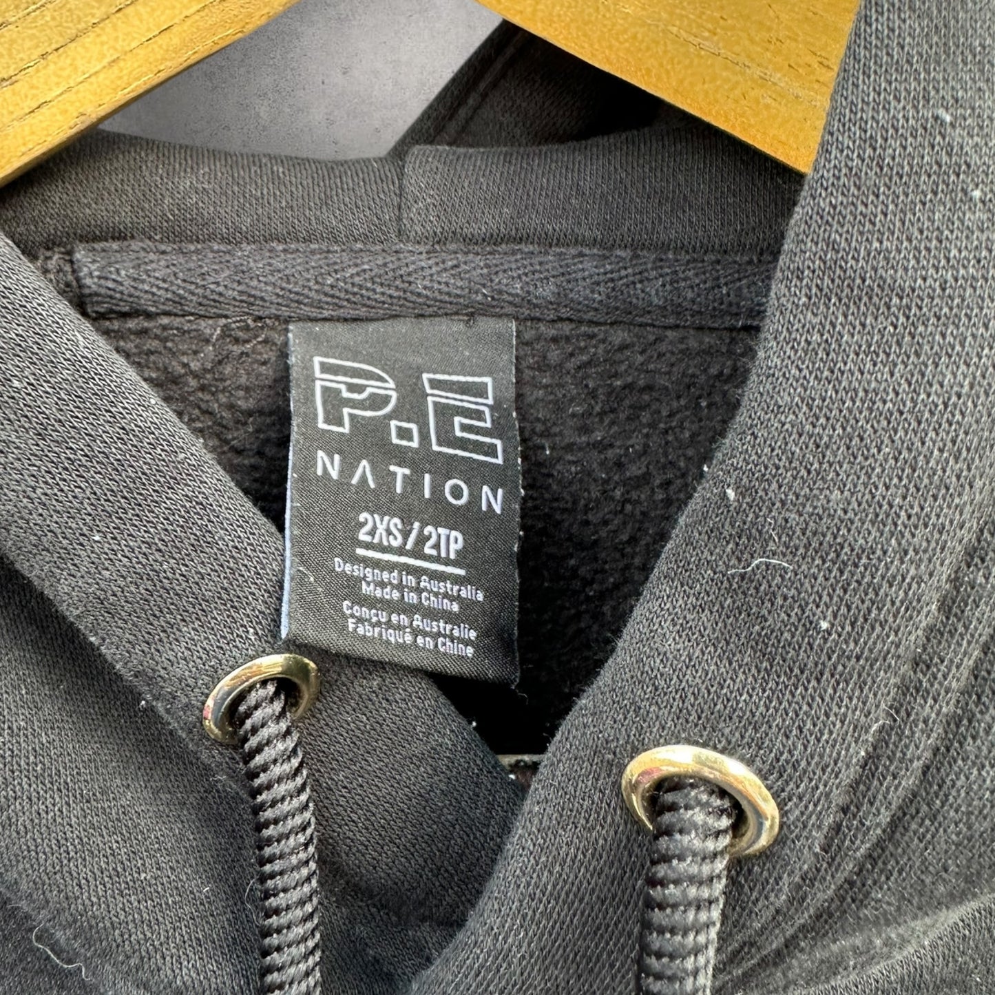PE NATION BLACK PULLOVER HOODED JUMPER