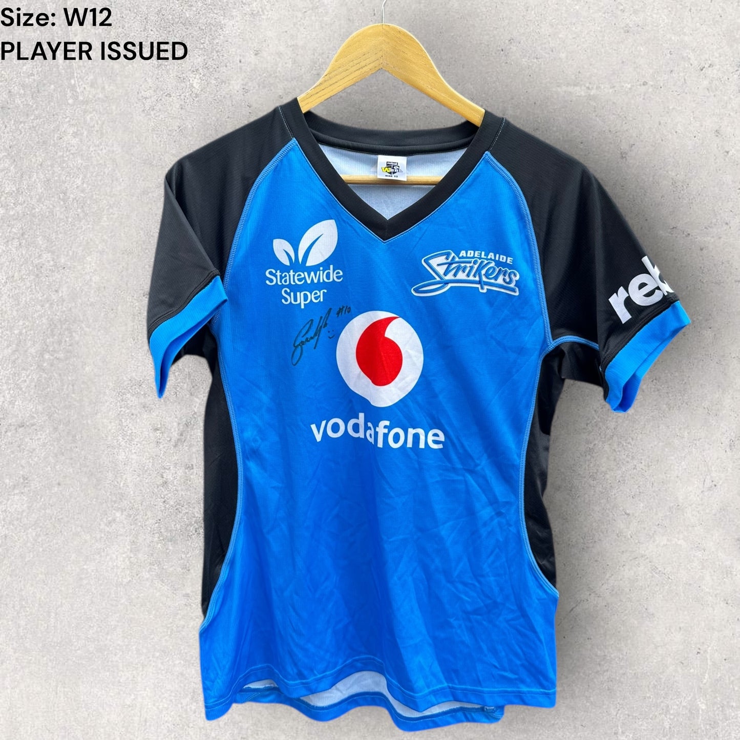 ADELAIDE STRIKERS WBBL TRAINING JERSEY PLAYER WORN + SIGNED AJ WELLINGTON