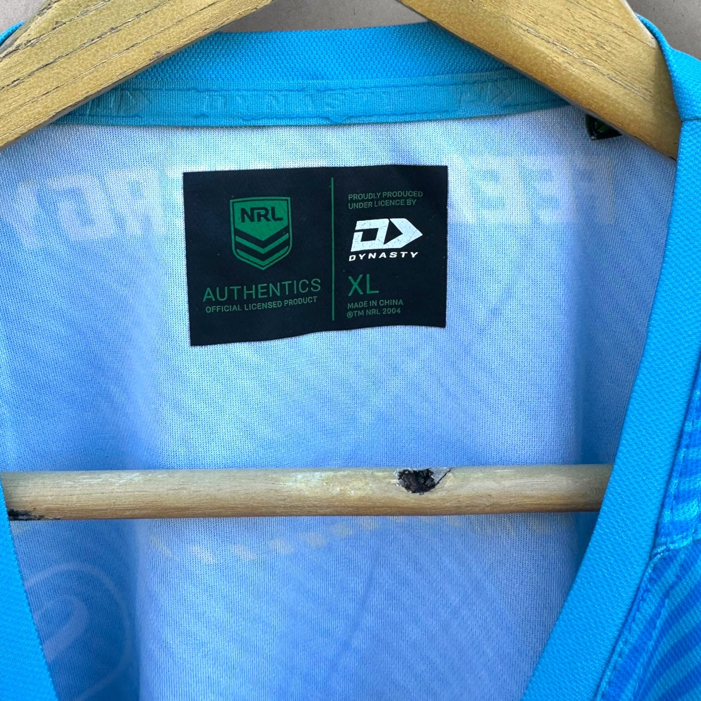 GOLD COAST TITANS PLAYER TRAINING SHIRT ISSUED TO SAM MCINTYRE