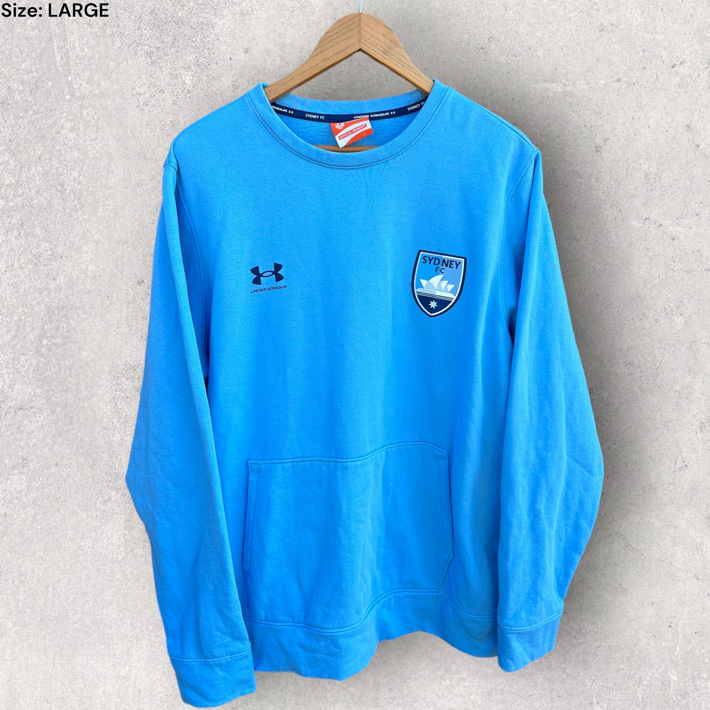 SYDNEY FC LIGHT BLUE UNDER ARMOUR PULLOVER JUMPER