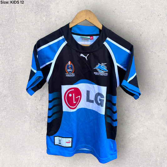 CRONULLA SHARKS 2005 HOME JERSEY SIGNED ON BACK